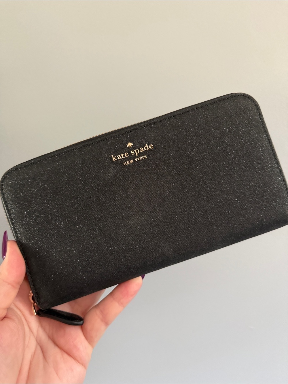 kate spade Black Glitter Zip Pouch with Gold Logo